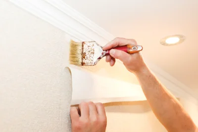 Pose de papier peint à Haux — revêtements muraux et toiles de verre